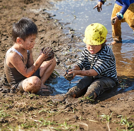 Children playing in mud