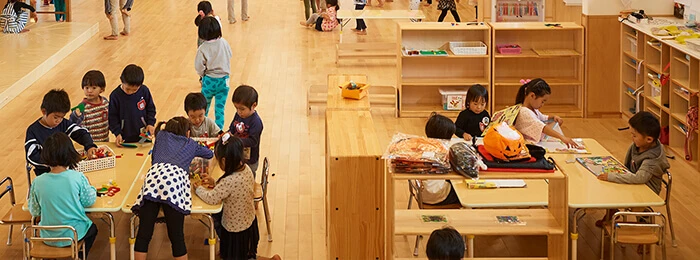 Children in a wooden nursery classroom