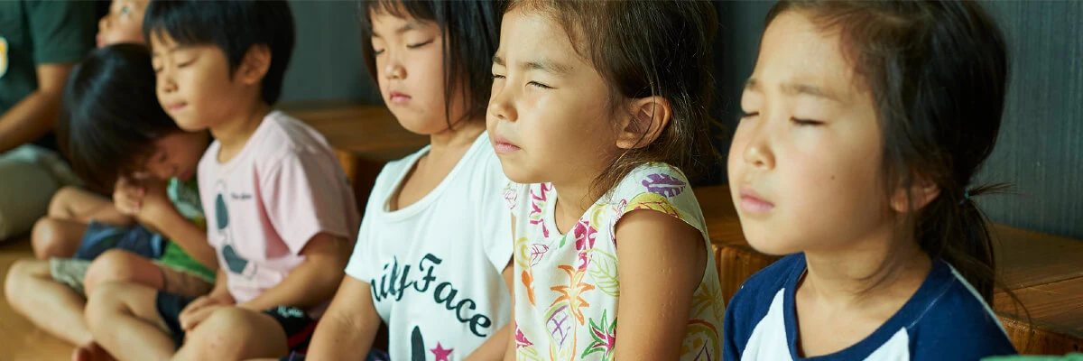 Children practicing zazen meditation