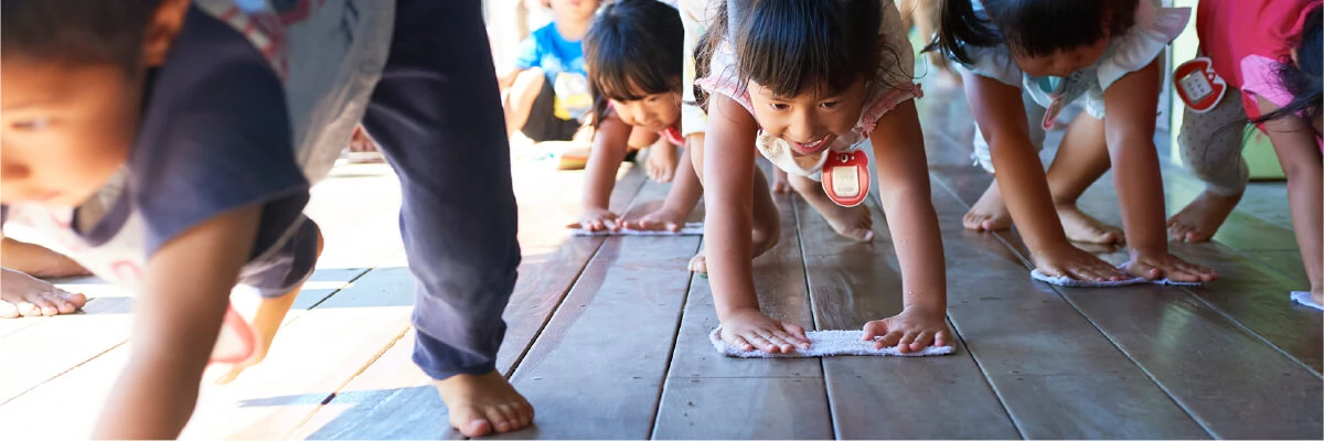 Children wiping the floor