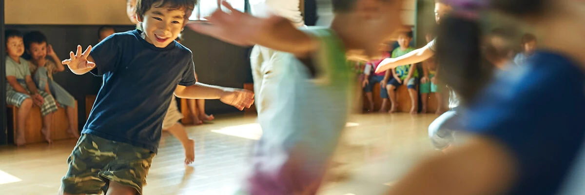 Children practicing rhythmic gymnastics