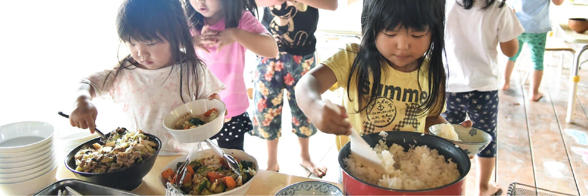 Children serving meals by themselves