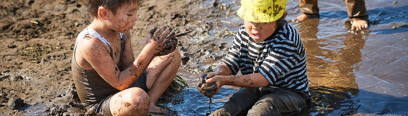 Children playing in mud