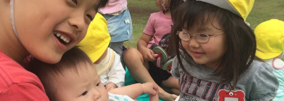 Children of different ages spending time together outdoors
