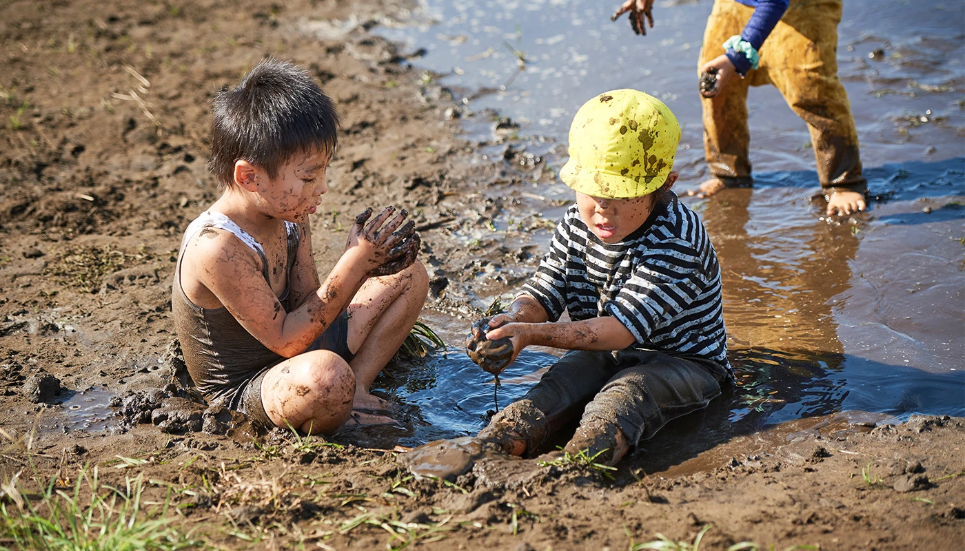 Children playing in mud