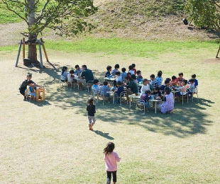 Cooks, nurturers and nursery principal eat together