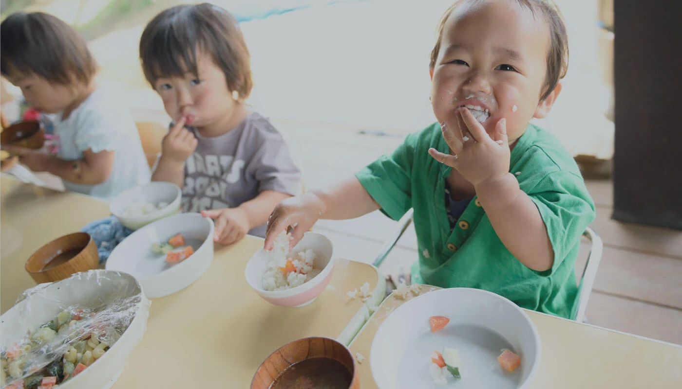 Children eating with their hands